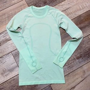 Lululemon women’s long sleeve running shirt.